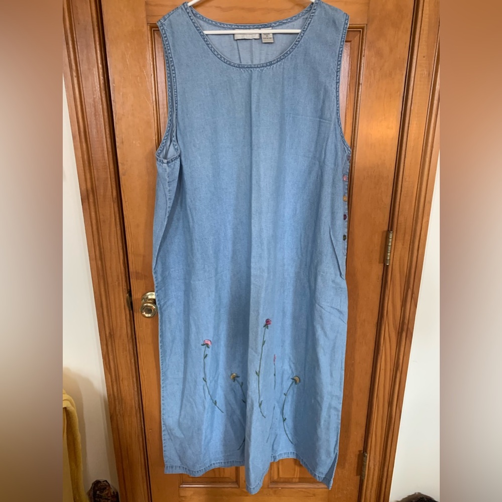 Women’s 3X sleeveless denim jumper dress mid-calf with flowers around bottom.